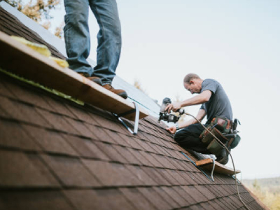 Professional roof installation on a residential home